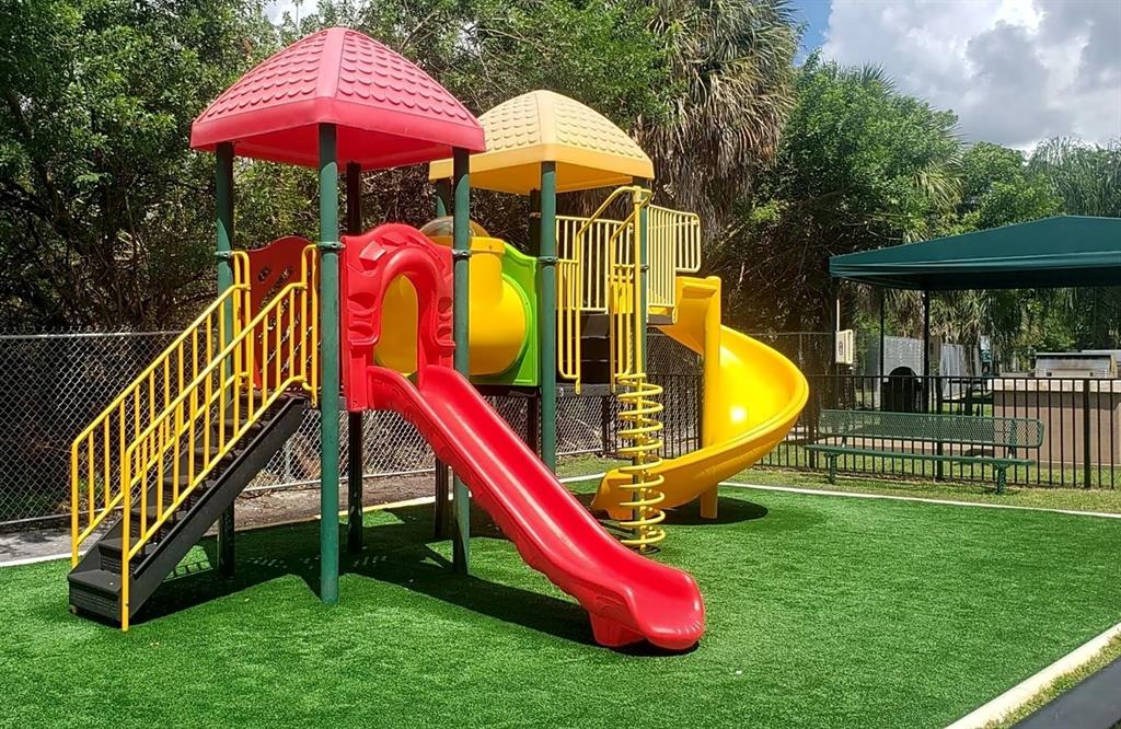 17350 Northwest 68th Avenue, Unit 400416 Hialeah, FL 33015 - Photo 16 of 16 a view of a slide with a slide