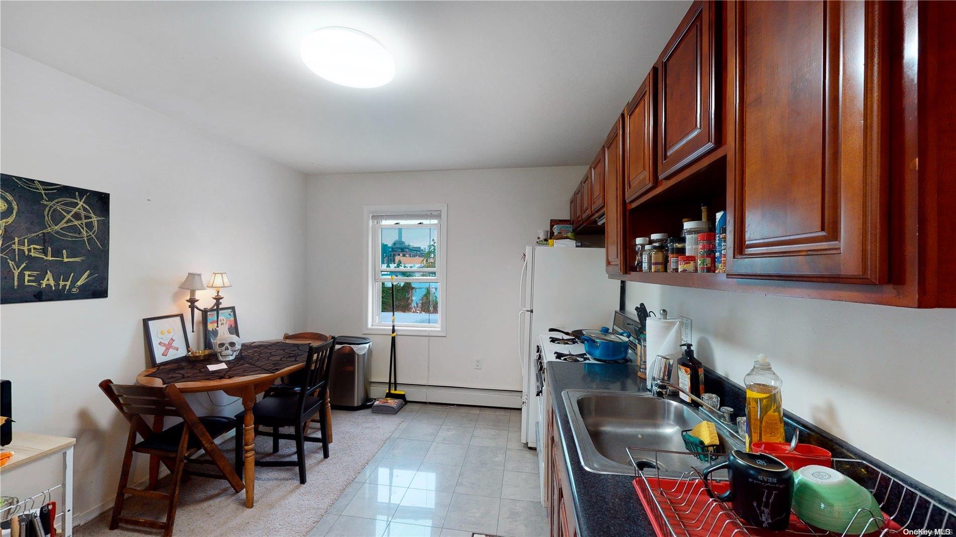 217 Java Street Brooklyn, NY 11222 - Photo 11 of 16 a view of a workspace with furniture and a window