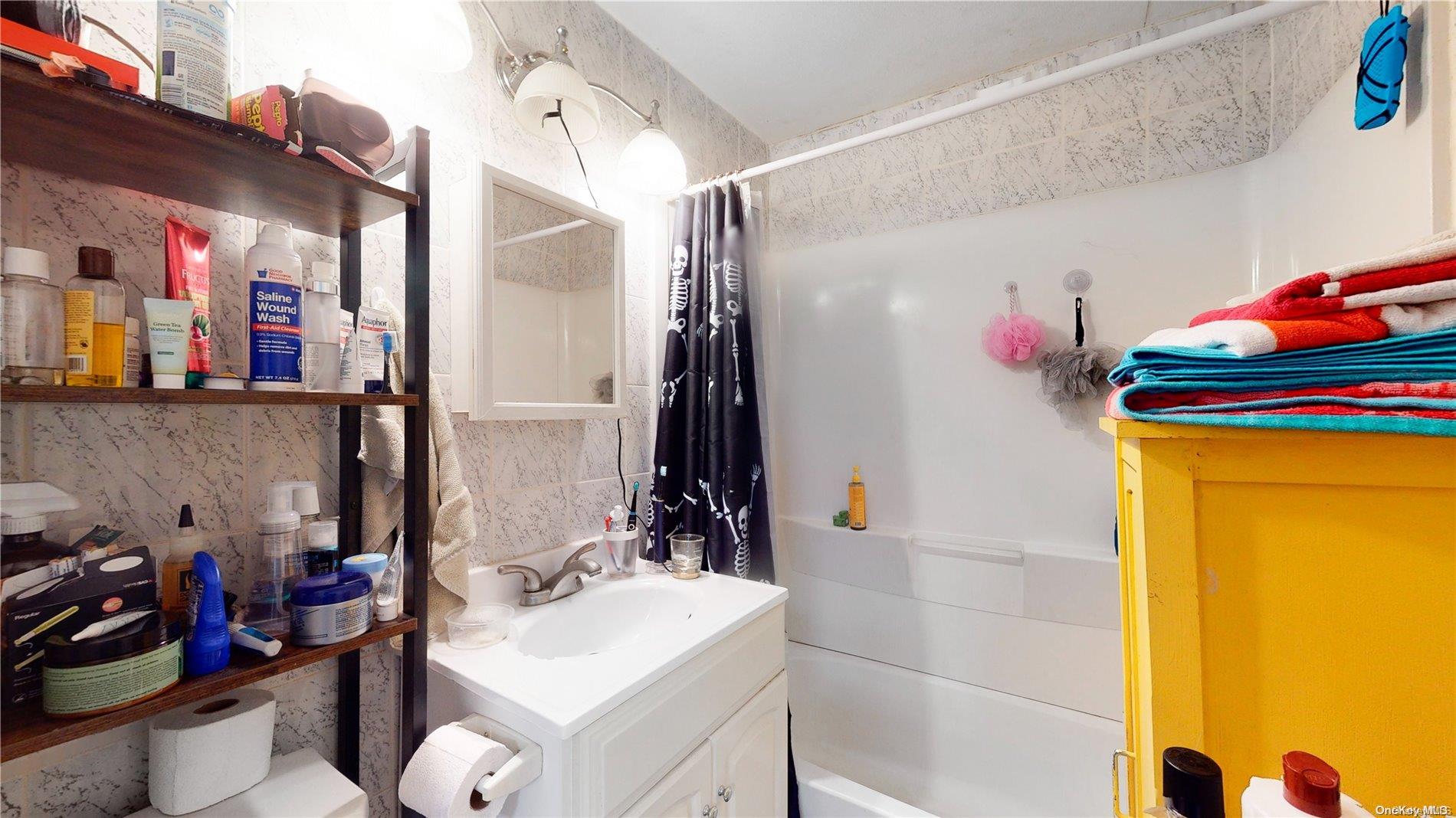 217 Java Street Brooklyn, NY 11222 - Photo 12 of 16 a bathroom with a sink mirror and toilet