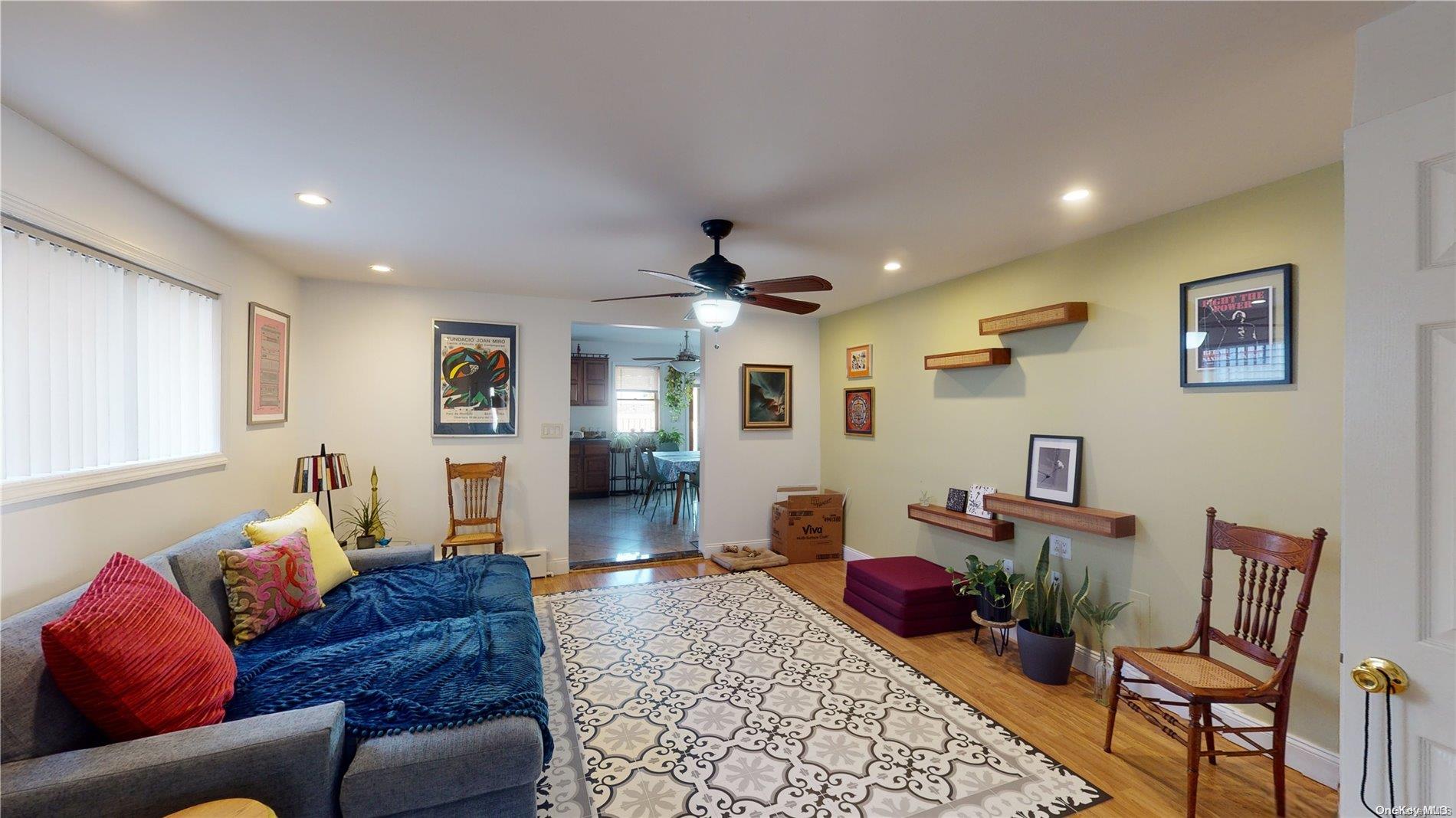 217 Java Street Brooklyn, NY 11222 - Photo 2 of 16 a living room with furniture and wooden floor