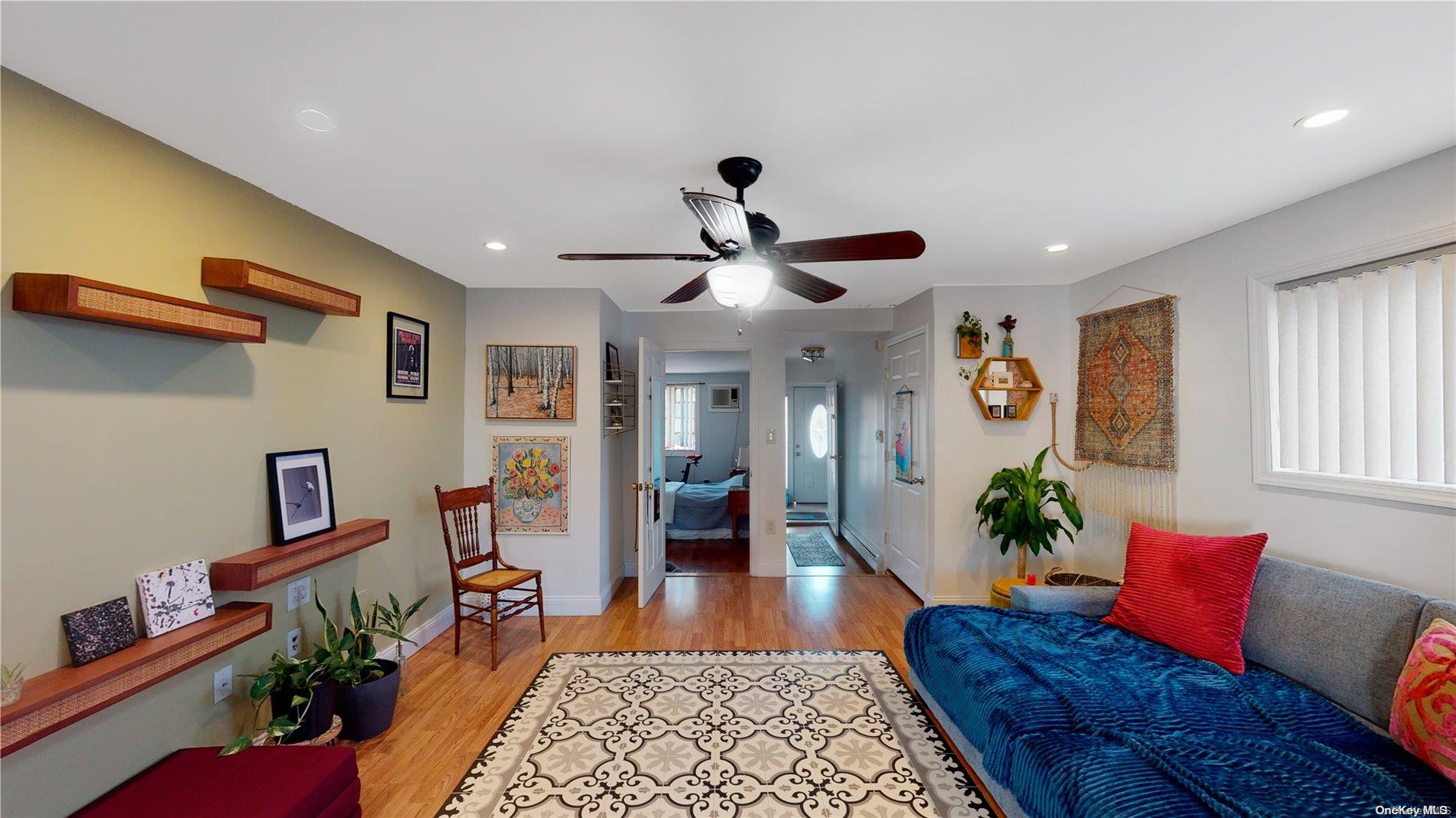 217 Java Street Brooklyn, NY 11222 - Photo 3 of 16 a living room with furniture potted plant and a window