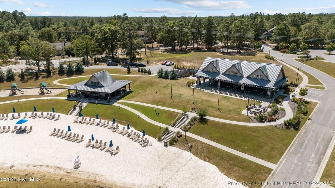 1420 Burning Tree Road Pinehurst, NC 28374 - Photo 11 of 50 a view of a swimming pool with a patio