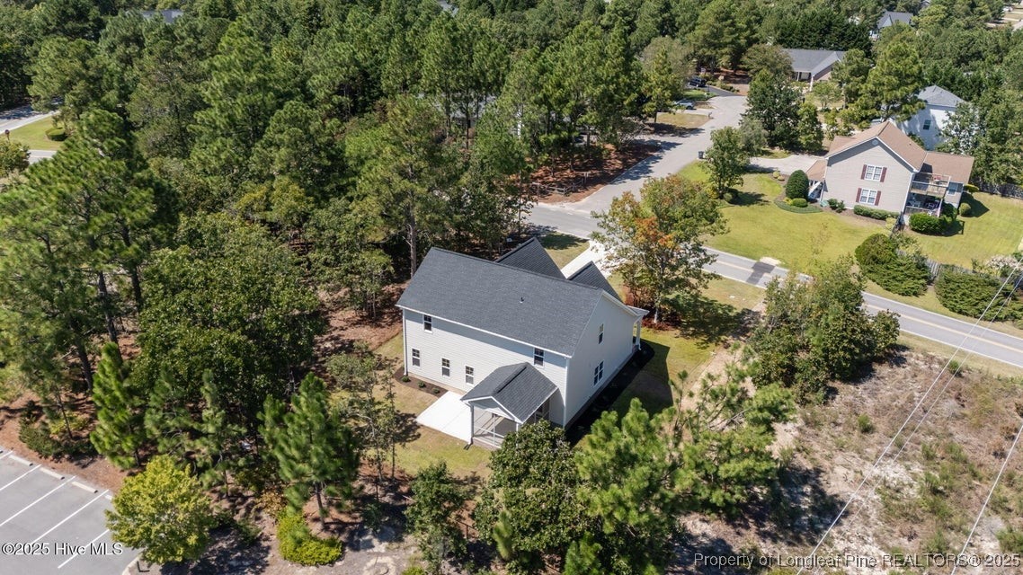1420 Burning Tree Road Pinehurst, NC 28374 - Photo 8 of 50 an aerial view of house with yard swimming pool and outdoor seating