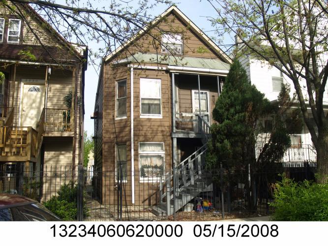 3222 North Drake Avenue Chicago, IL 60618 - Photo 2 of 2 a view of house with a outdoor space