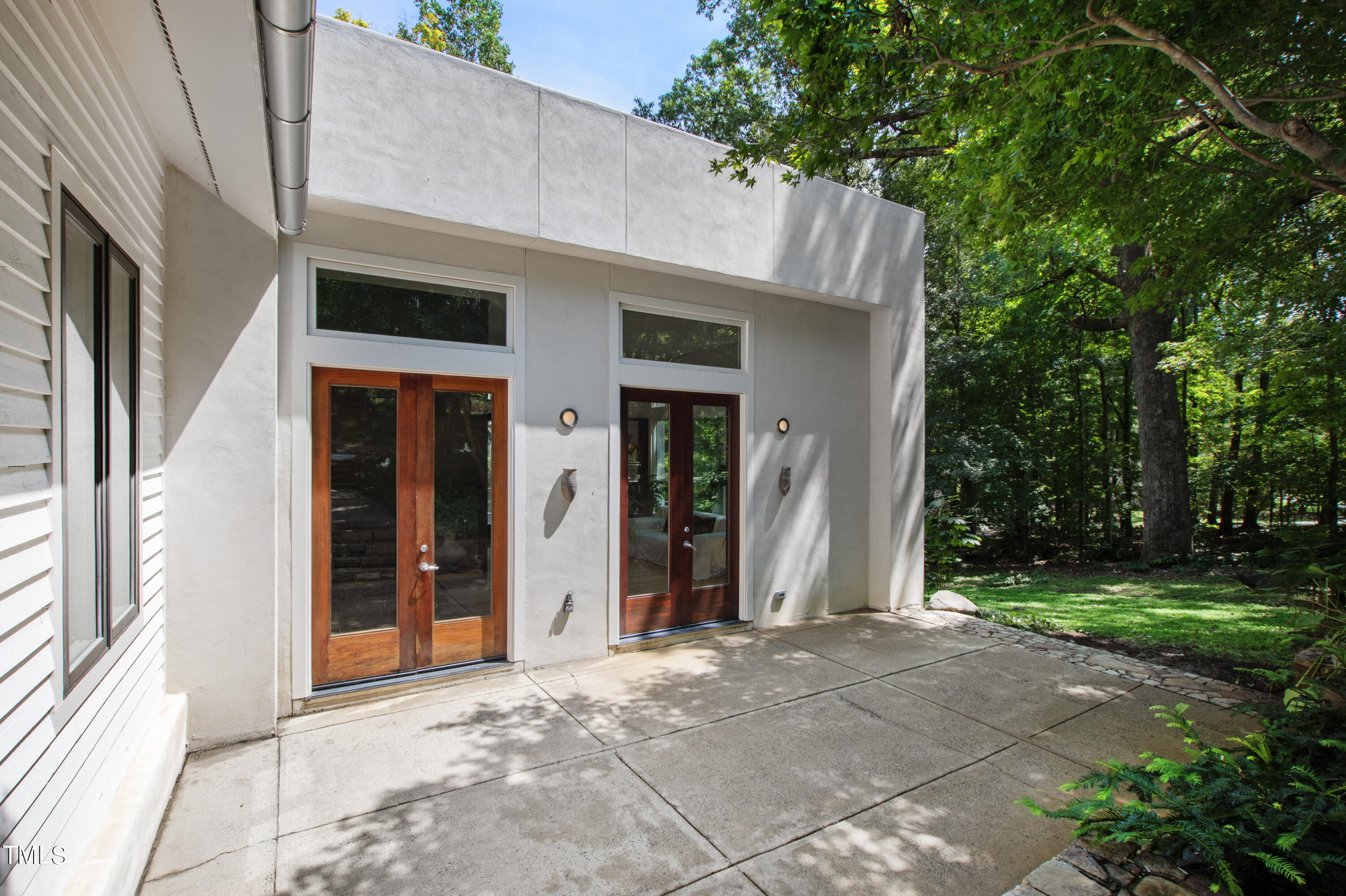 400 Ray Road Chapel Hill, NC 27516 - Photo 75 of 85 Front patio opens to living room for indoor/outdoor entertaining