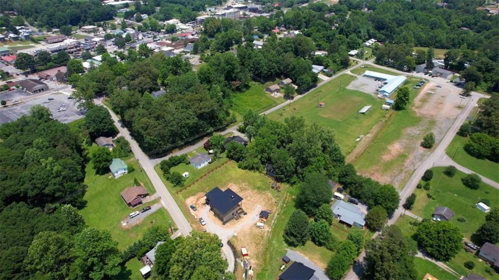 485 Church Street Blue Ridge, GA 30513 - Photo 81 of 85 an aerial view of residential houses with outdoor space and trees