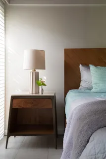 a bathroom with a sink a mirror and shower