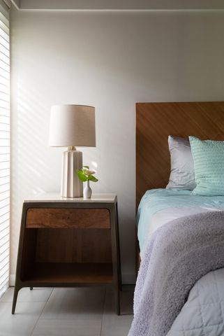 a kitchen with granite countertop a refrigerator and a sink