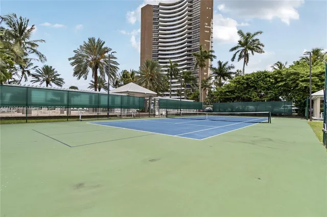 a view of swimming pool with outdoor seating and yard