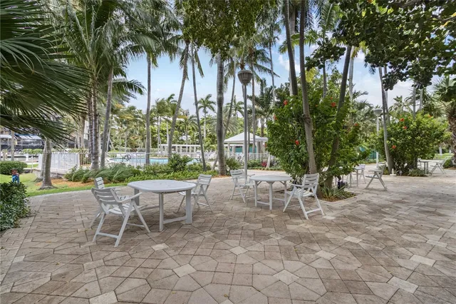 a view of a lounge chairs with a patio