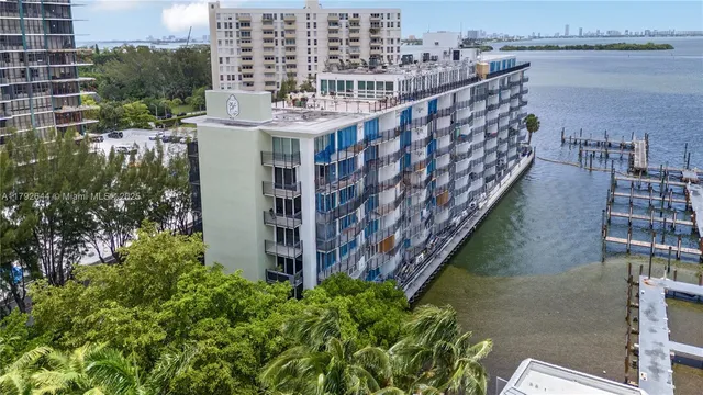 a view of building with outdoor space and plants