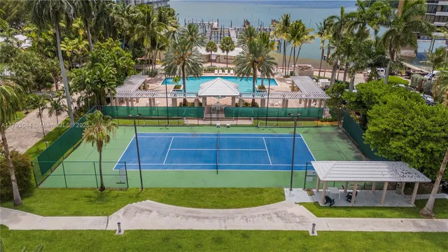 a view of a houses with a swimming pool