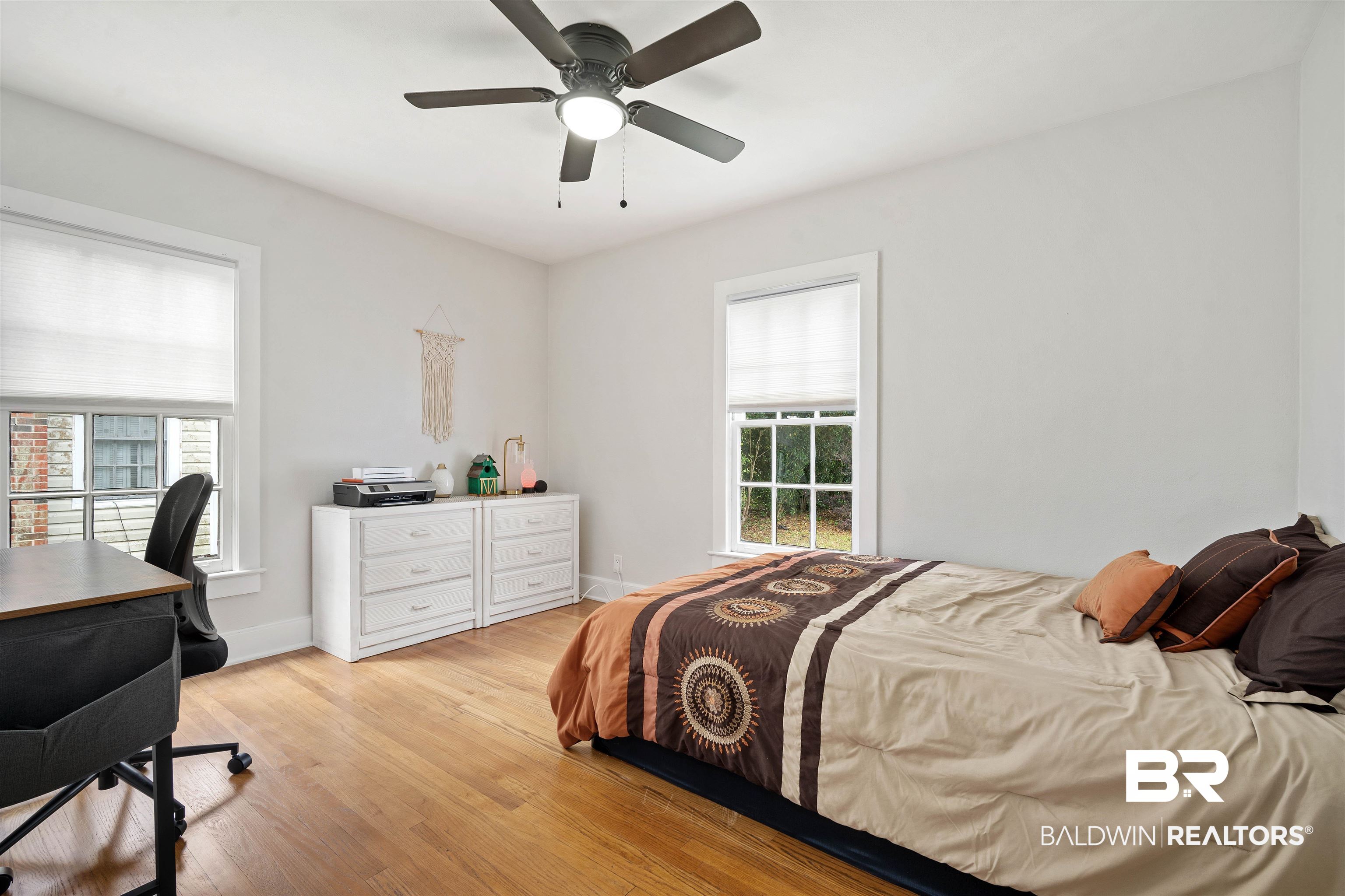 103 Emogene Place Mobile, AL 36606 - Photo 22 of 32 Bedroom featuring light wood-type flooring, a desk, and a ceiling fan