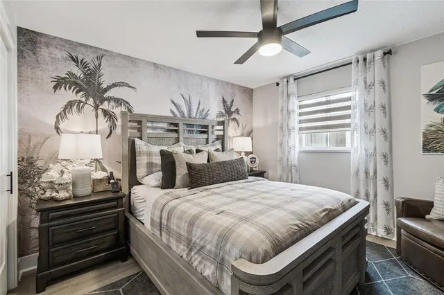 a bathroom with a toilet a sink and shower