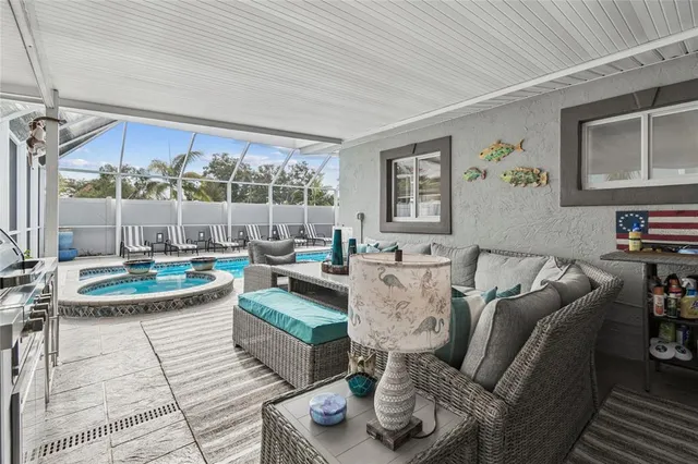 a view of a swimming pool with a patio