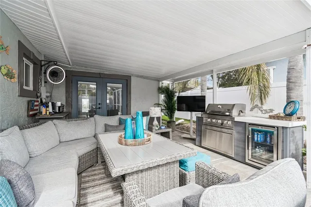 a view of a living room and kitchen