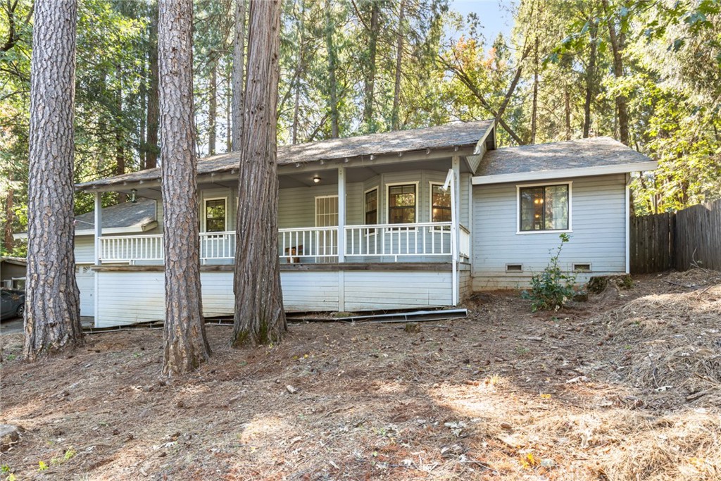 6350 Amherst Way Magalia, CA 95954 - Photo 21 of 25 a view of a house with a yard