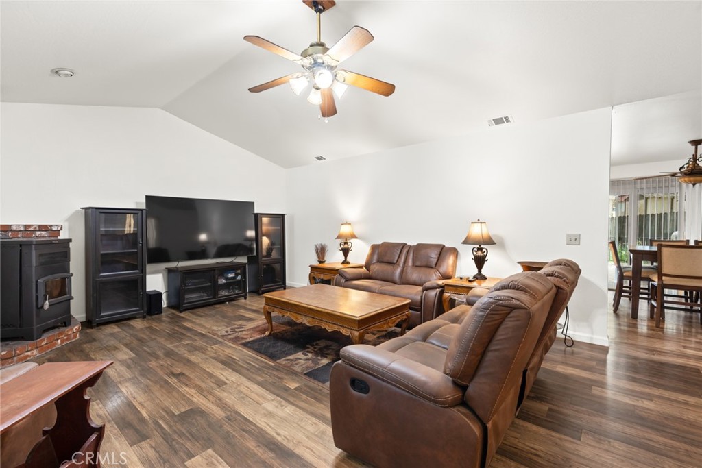 6350 Amherst Way Magalia, CA 95954 - Photo 4 of 25 a living room with furniture and a flat screen tv