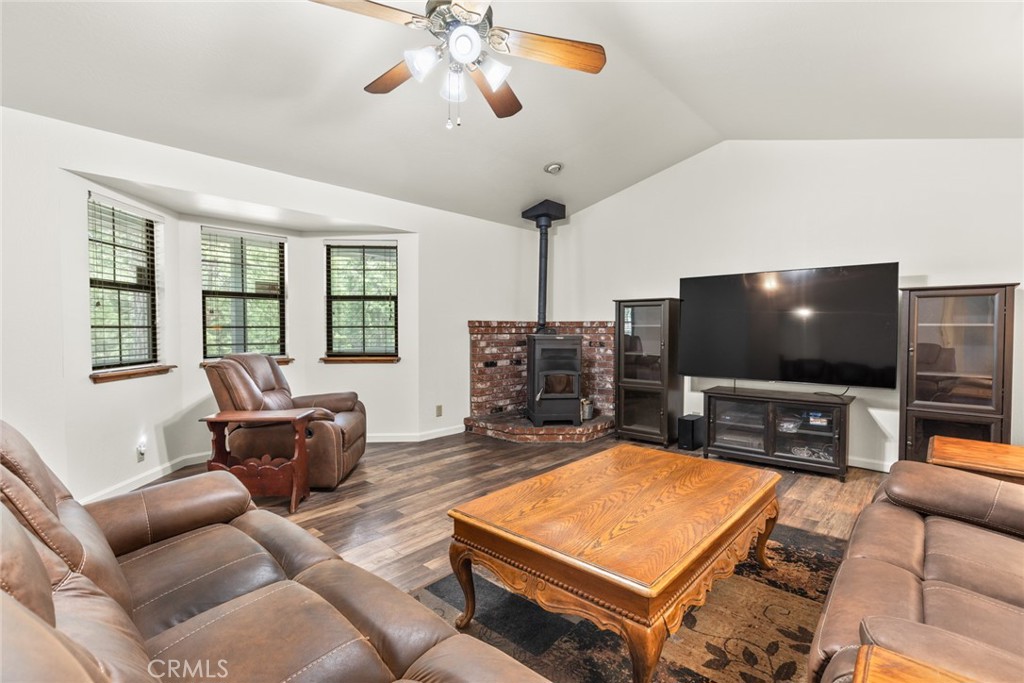 6350 Amherst Way Magalia, CA 95954 - Photo 7 of 25 a living room with furniture and a flat screen tv