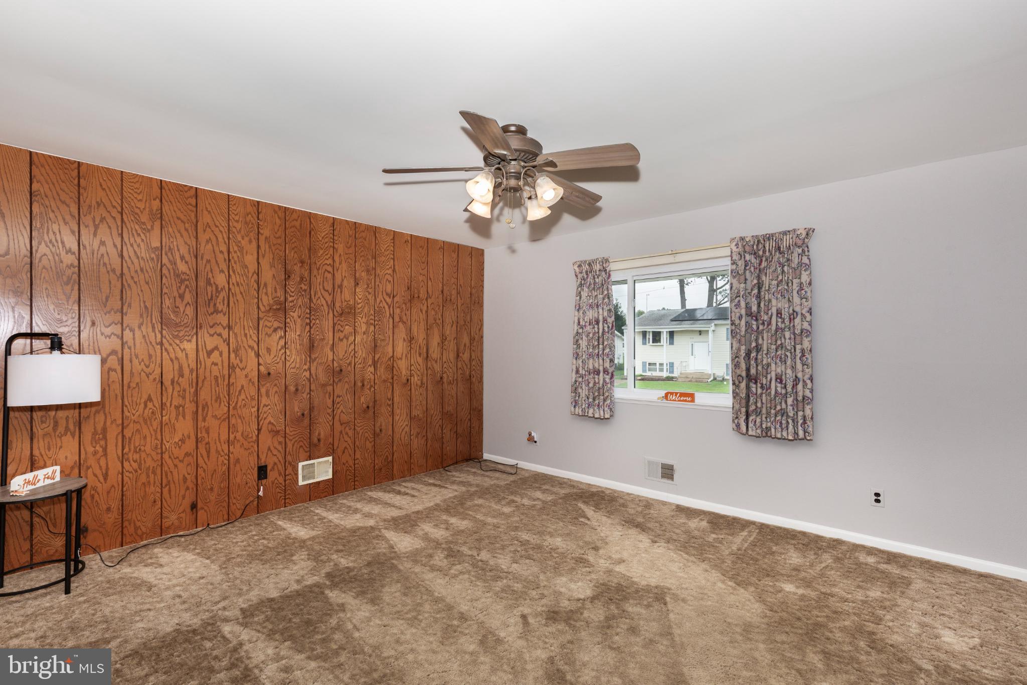 520 Crisfield Road Baltimore, MD 21220 - Photo 12 of 27 a view of an empty room with a window