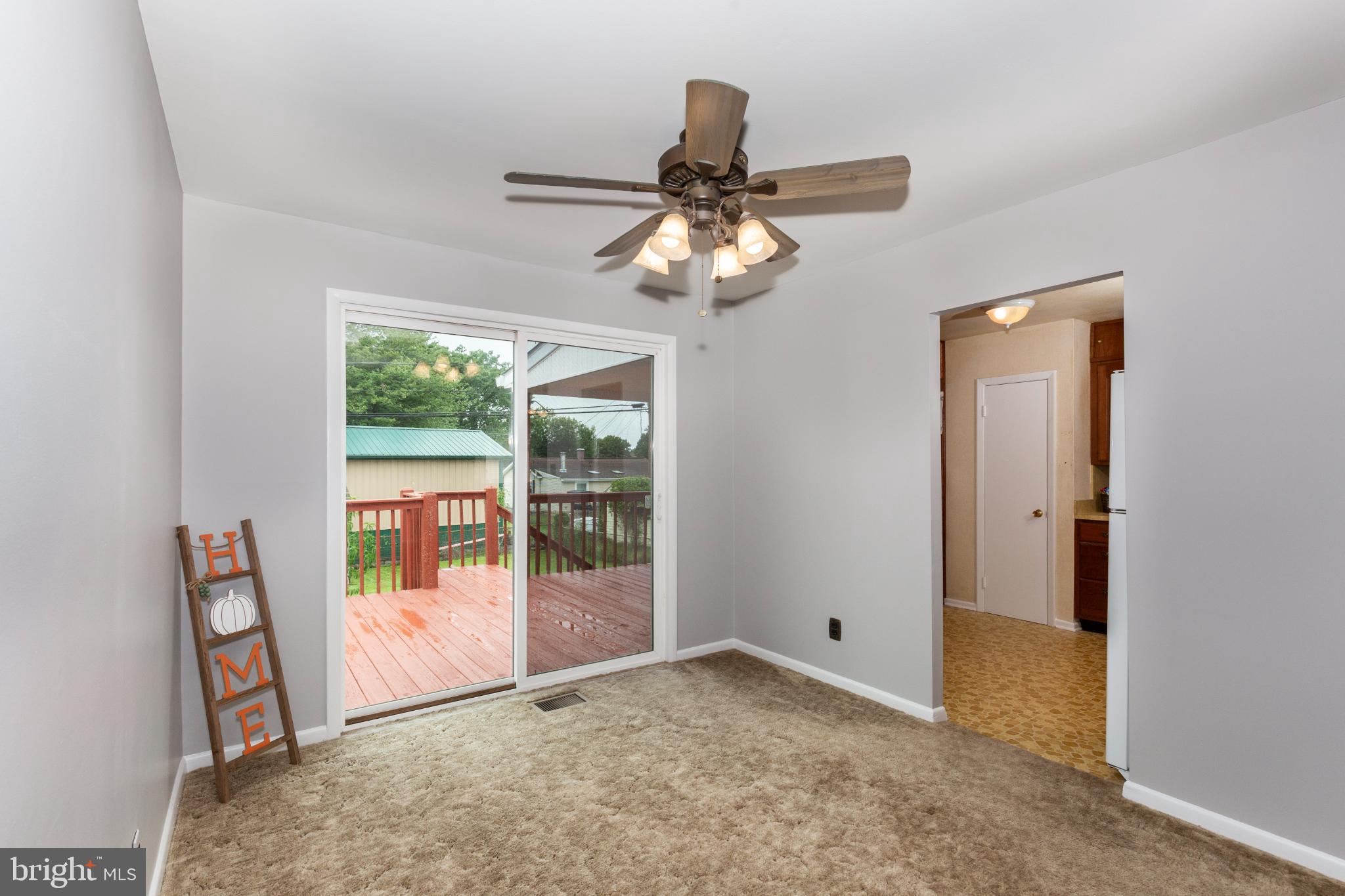 520 Crisfield Road Baltimore, MD 21220 - Photo 14 of 27 a view of an empty room with a window