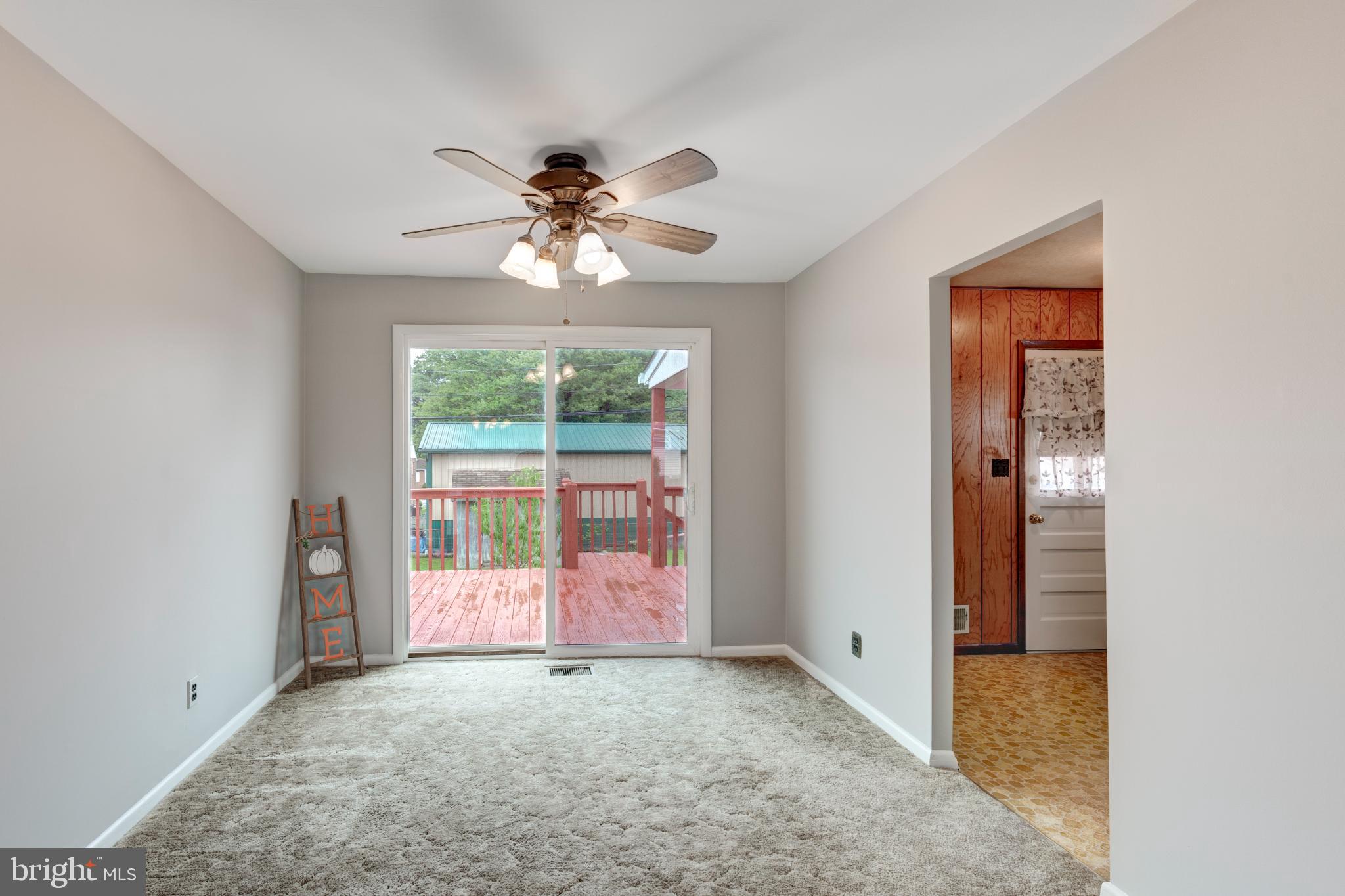 520 Crisfield Road Baltimore, MD 21220 - Photo 15 of 27 an empty room with windows and closet