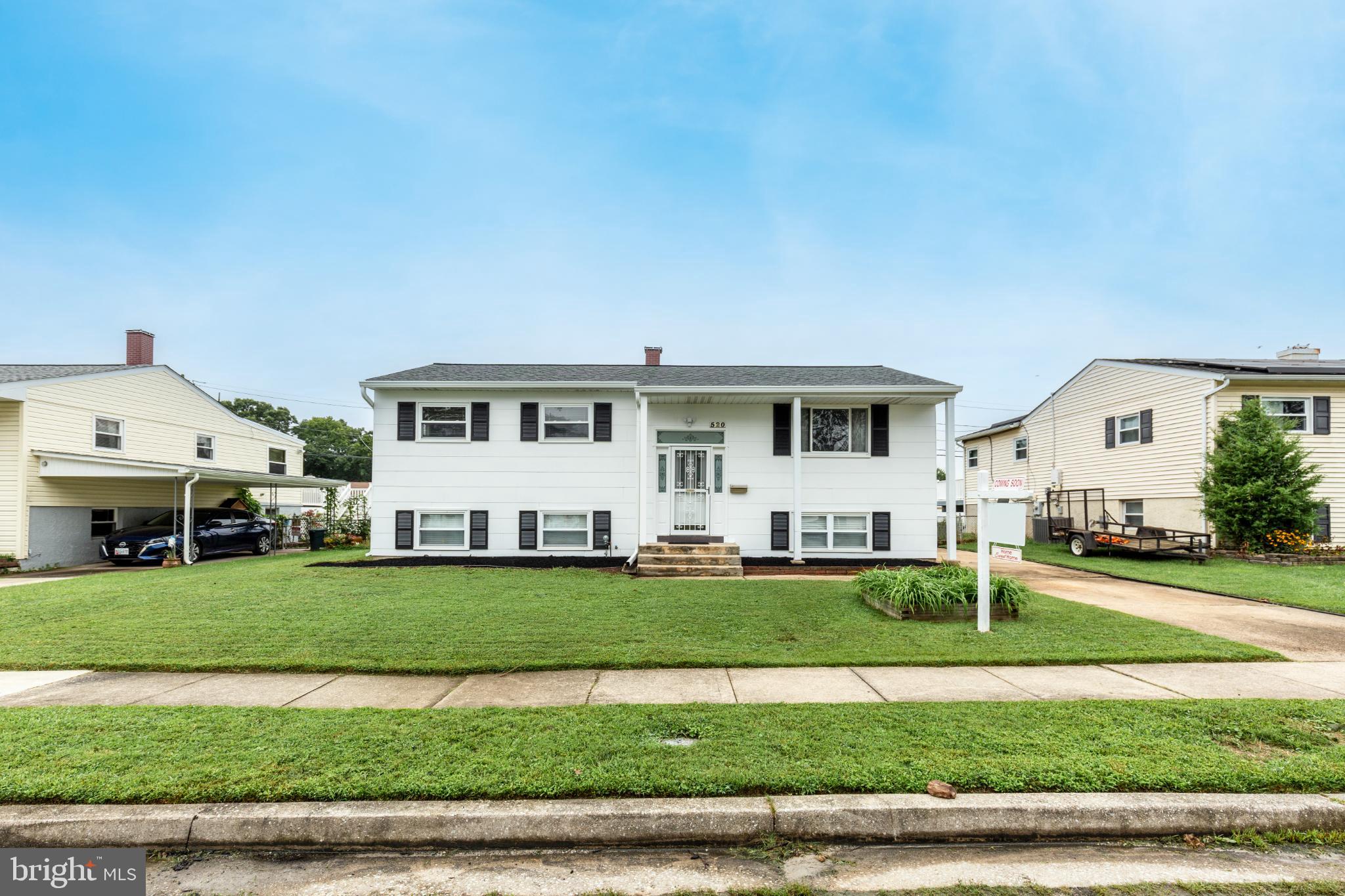 520 Crisfield Road Baltimore, MD 21220 - Photo 3 of 27 a front view of a house with a yard