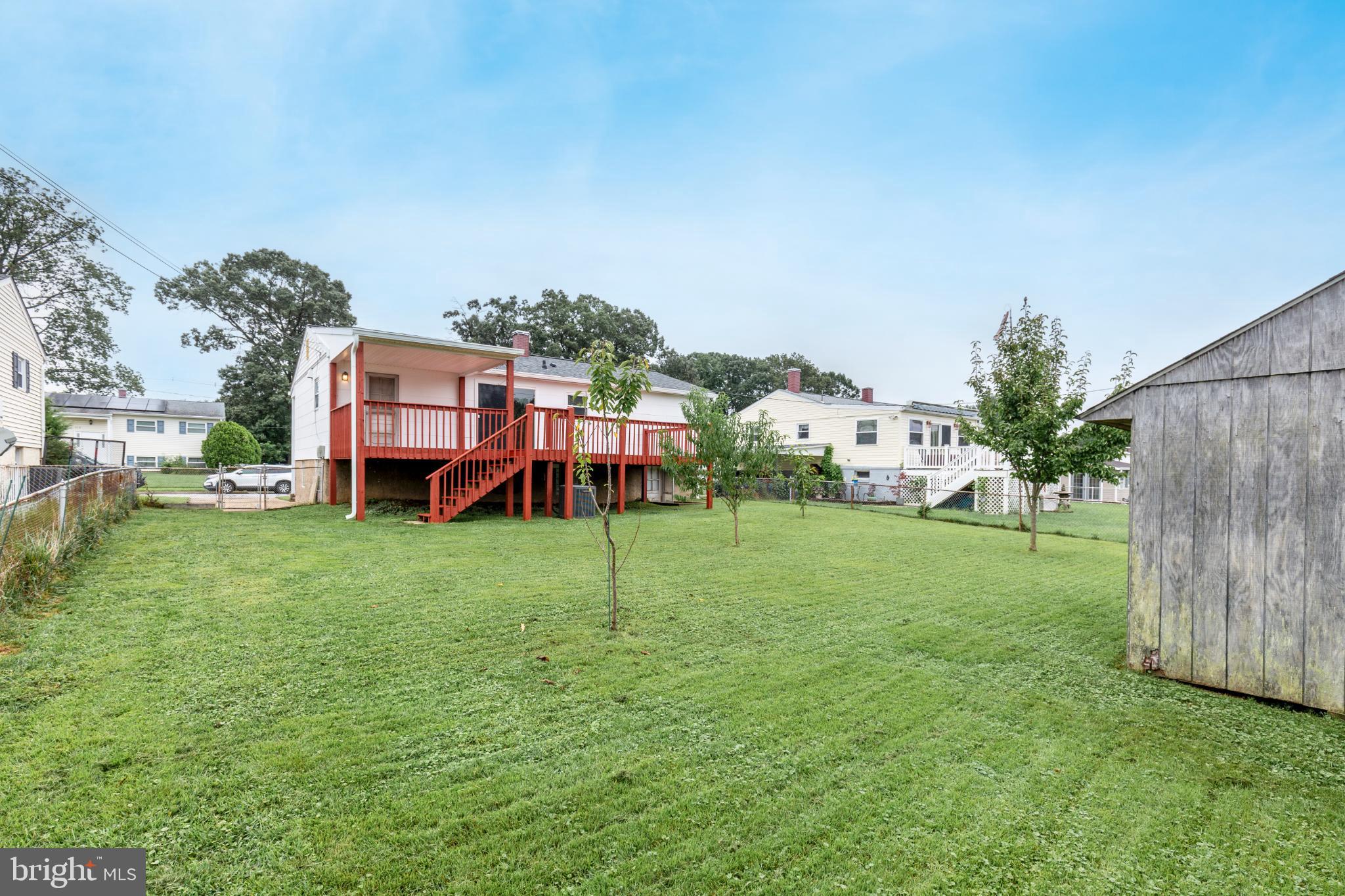 520 Crisfield Road Baltimore, MD 21220 - Photo 4 of 27 a view of a house with a backyard