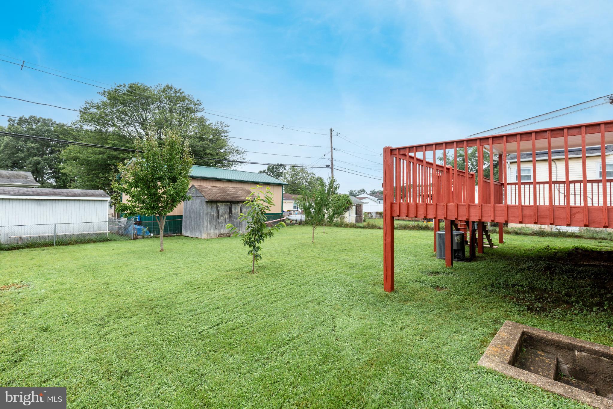 520 Crisfield Road Baltimore, MD 21220 - Photo 5 of 27 a view of a house with backyard and a sitting area