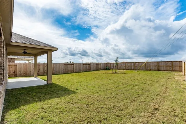 a view of a swimming pool with an outdoor space