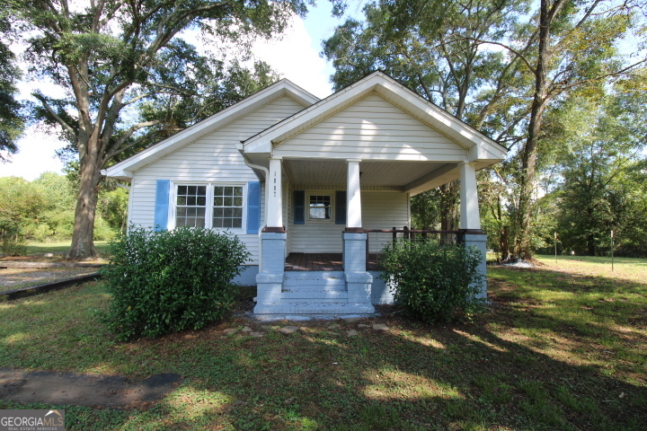 1887 Green Valley Road Griffin, GA 30224 - Photo 1 of 34 a front view of a house with garden