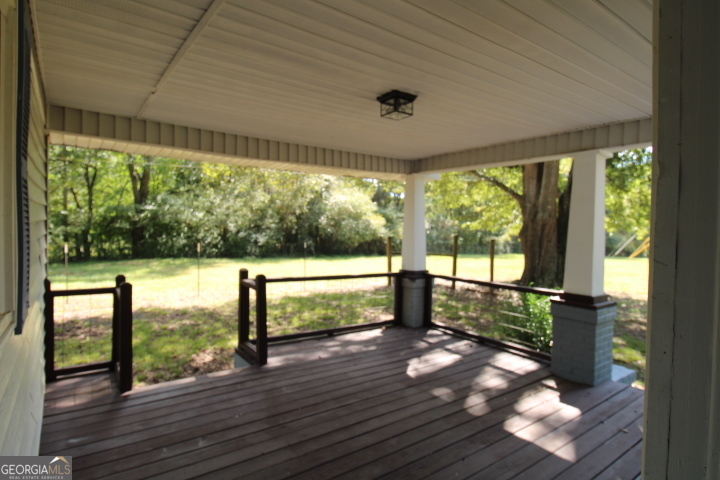 1887 Green Valley Road Griffin, GA 30224 - Photo 2 of 34 a view of outdoor space with wooden floor and outdoor space