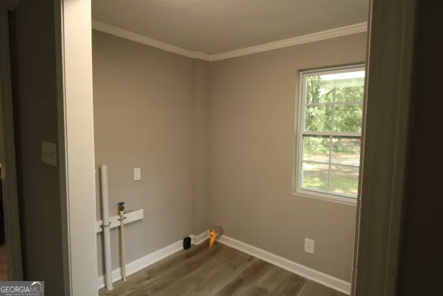 a view of a room that has a window in it