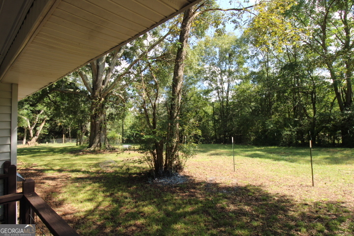 1887 Green Valley Road Griffin, GA 30224 - Photo 25 of 34 a view of a yard with a tree