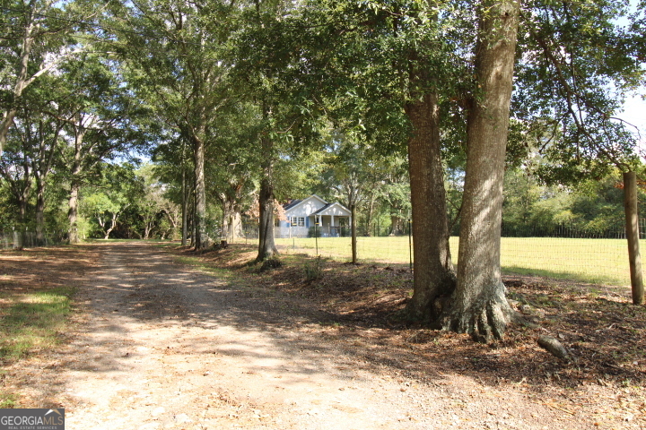 1887 Green Valley Road Griffin, GA 30224 - Photo 28 of 34 a view of a yard with trees