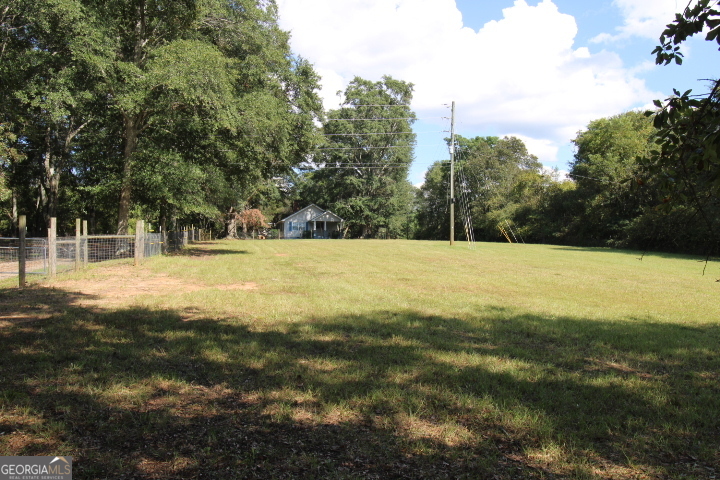 1887 Green Valley Road Griffin, GA 30224 - Photo 29 of 34 a view of swimming pool with a yard