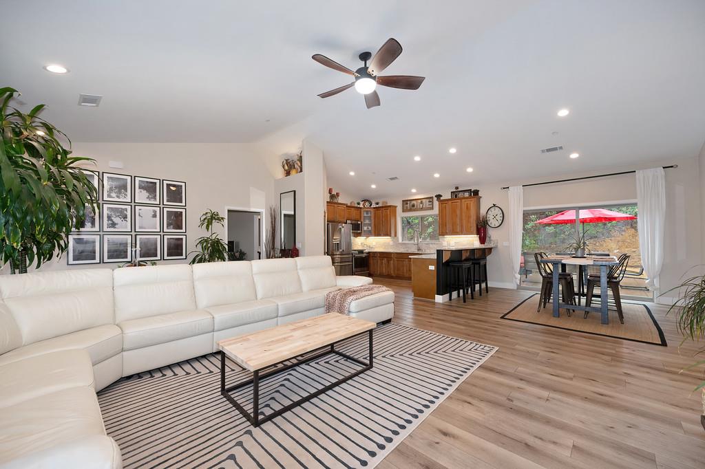 3960 Fort Jim Road Placerville, CA 95667 - Photo 15 of 64 a living room with furniture kitchen view and a wooden floor