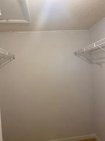 a view of small space with racks on the wall