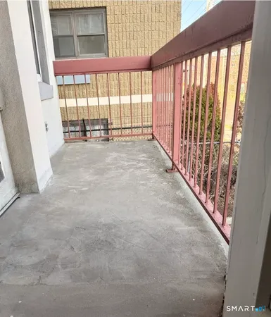 a view of a pathway with a yard