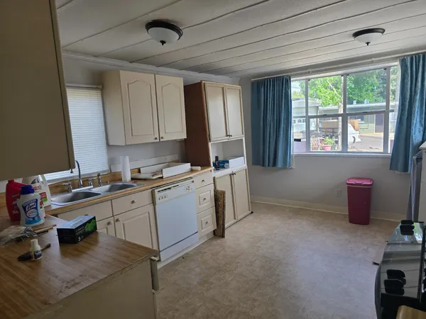 a room with furniture and window