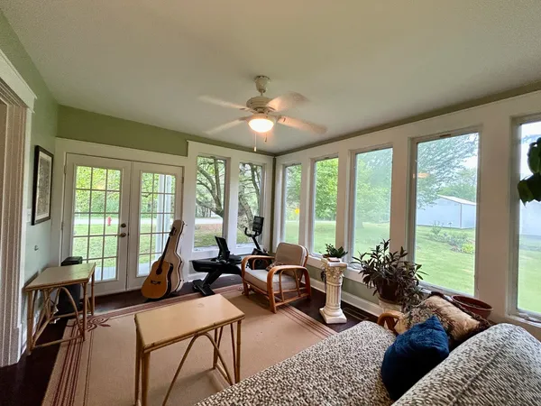 a view of a window with wooden floor