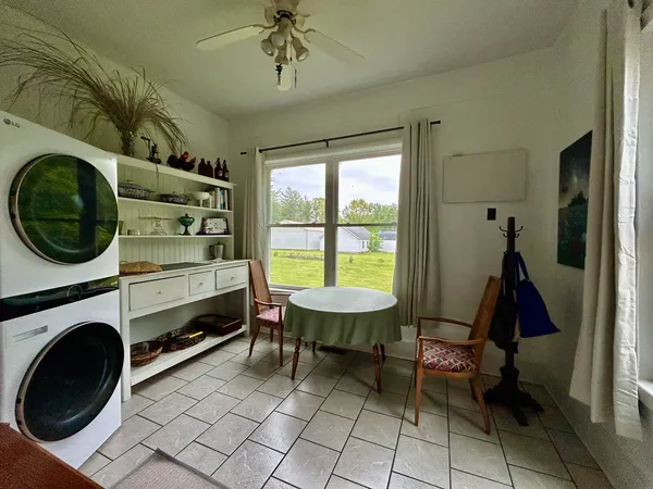 a view of a kitchen with washer and dryer