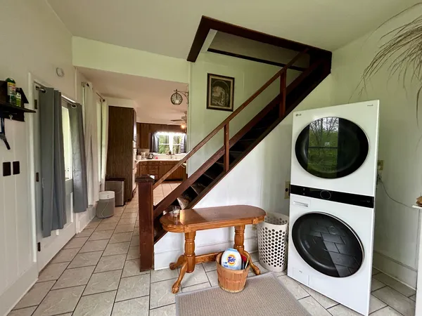 a bedroom with a bed and dresser