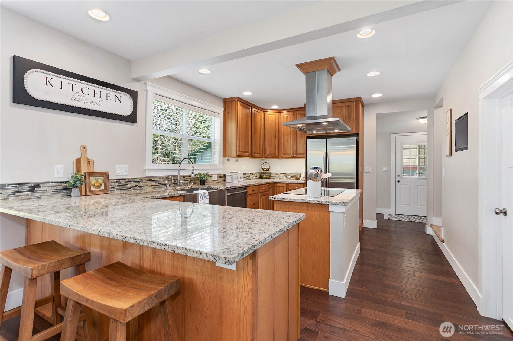 3269 Haynie Road Custer, WA 98240 - Photo 14 of 39 a kitchen with stainless steel appliances granite countertop a sink a stove and a refrigerator