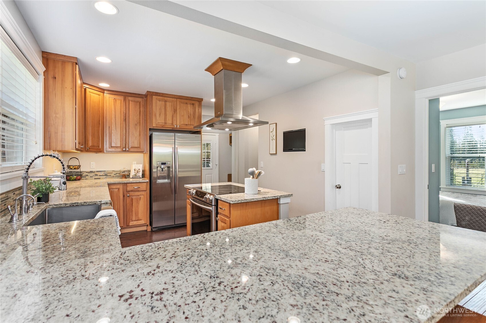 3269 Haynie Road Custer, WA 98240 - Photo 16 of 39 a kitchen with granite countertop a sink stove and refrigerator