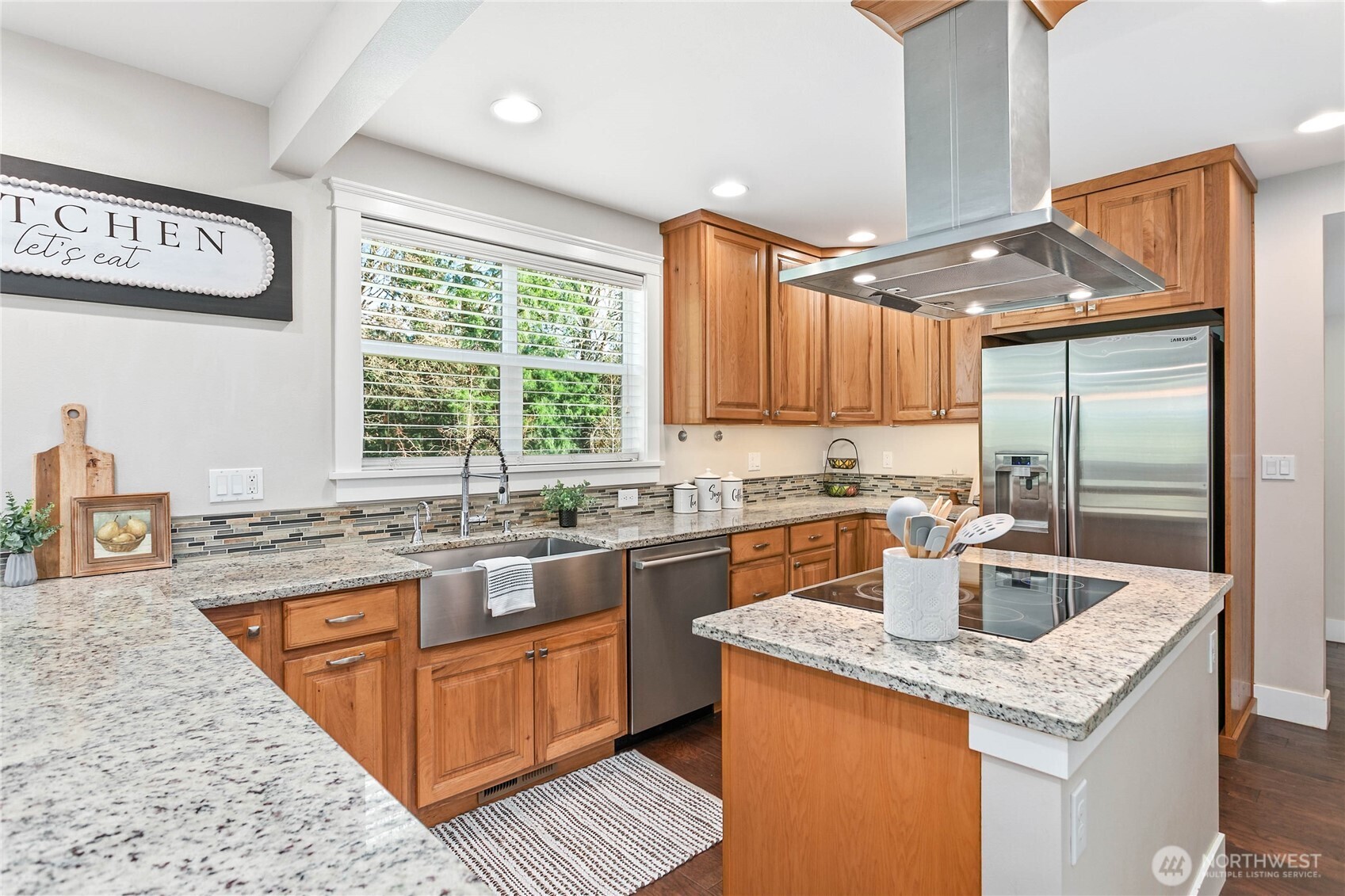 3269 Haynie Road Custer, WA 98240 - Photo 17 of 39 a kitchen with stainless steel appliances granite countertop a sink stove and cabinets