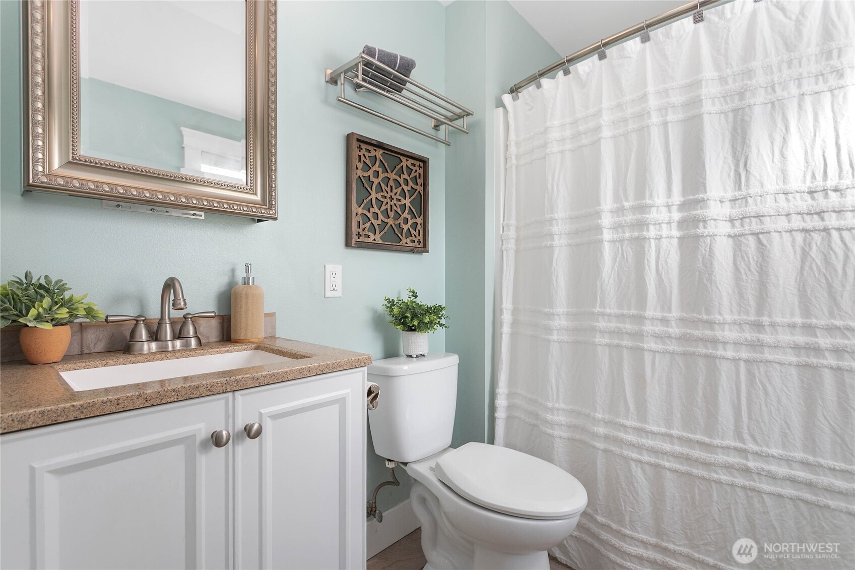 3269 Haynie Road Custer, WA 98240 - Photo 21 of 39 a bathroom with a granite countertop sink and a toilet