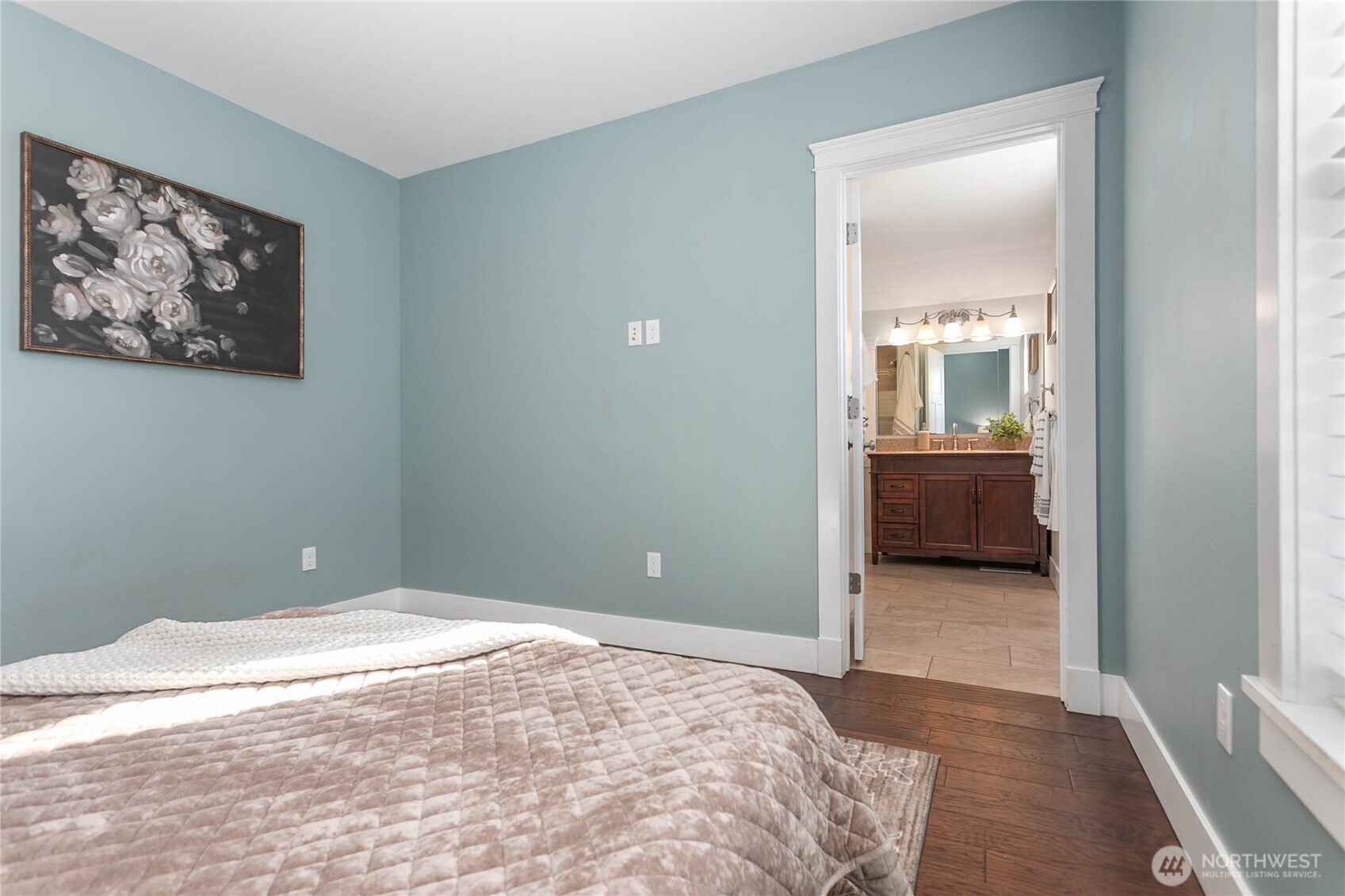 3269 Haynie Road Custer, WA 98240 - Photo 24 of 39 a bedroom with a bed and a painting on the wall