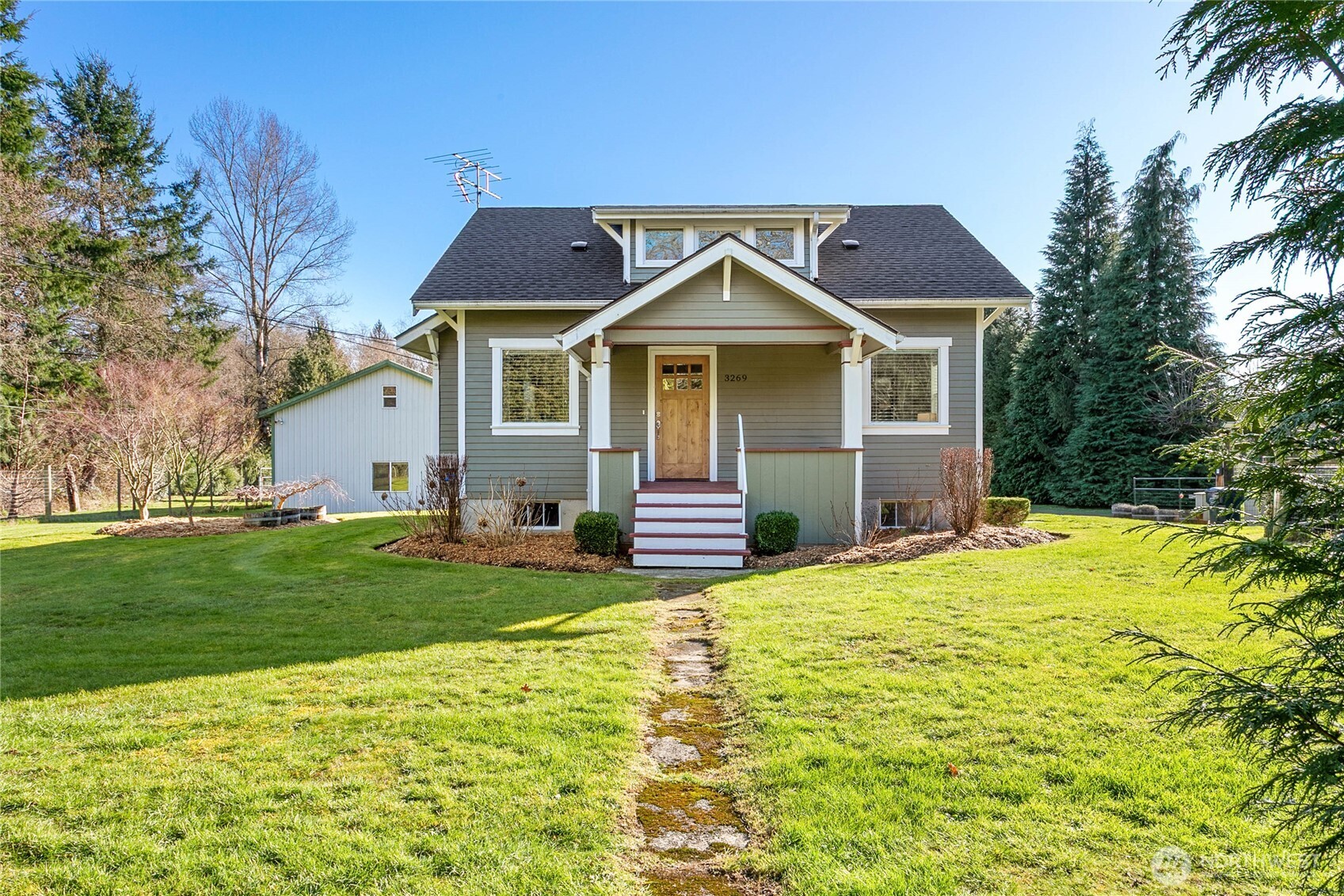 3269 Haynie Road Custer, WA 98240 - Photo 4 of 39 a front view of a house with a garden