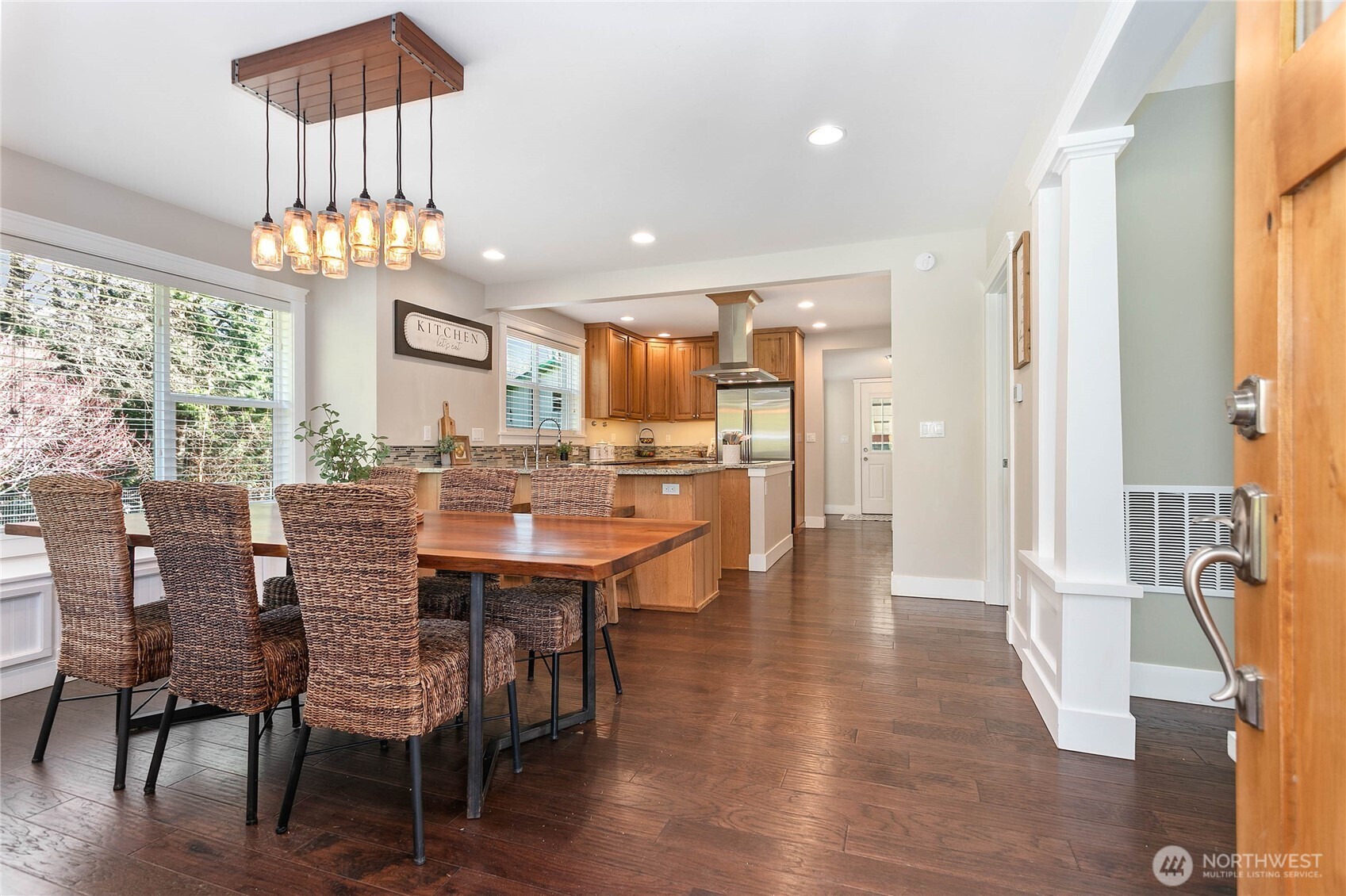 3269 Haynie Road Custer, WA 98240 - Photo 5 of 39 a view of a dining room with furniture a chandelier and wooden floor